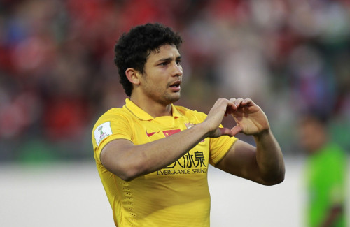 The heart gesture by Elkeson of China's Guangzhou Evergrande - now much imitated by Gareth Bale. The heart gesture by Elkeson of China's Guangzhou Evergrande - now much imitated by Gareth Bale.