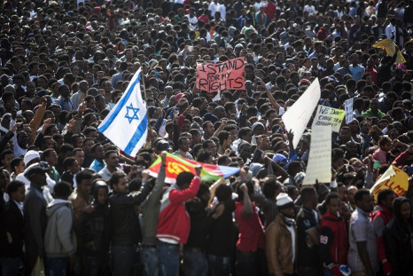 Up to 30,000 African migrants, mainly from Eritrea and Sudan, hold a rally in Tel Aviv's Rabin Square.
