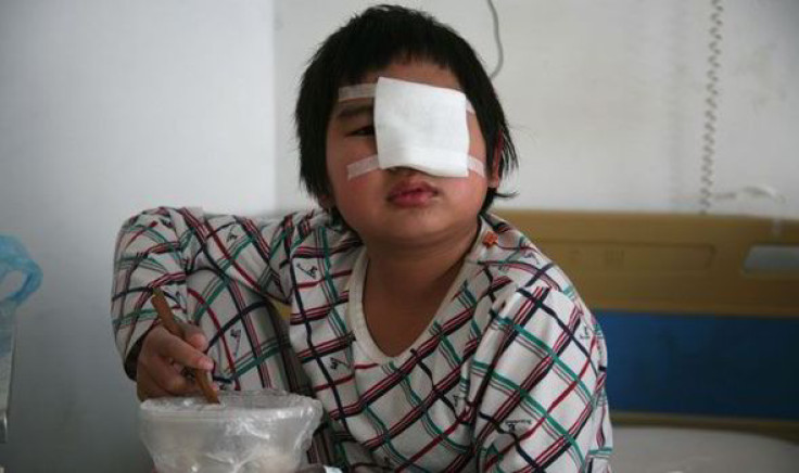 Chinese boy slapped by classmates