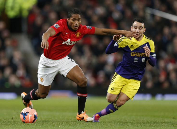 Antonio Valencia and Leon Britton