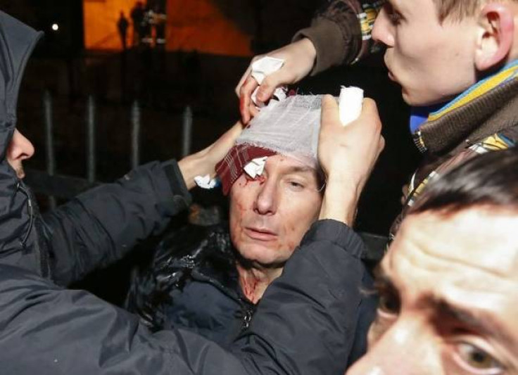 Yuri Lutsenko receives treatment after reportedly being beaten by police.