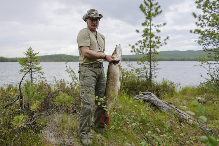Number 3: Russia's President Vladimir Putin poses for a picture as he fishes in the Krasnoyarsk territory.