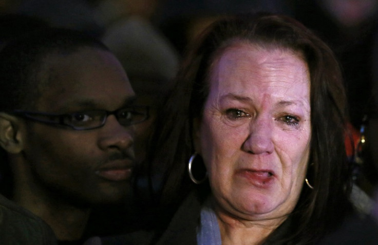 Pamela Duggan, the mother of Mark Duggan, weeps outside the High Court in London January 8, 2014.