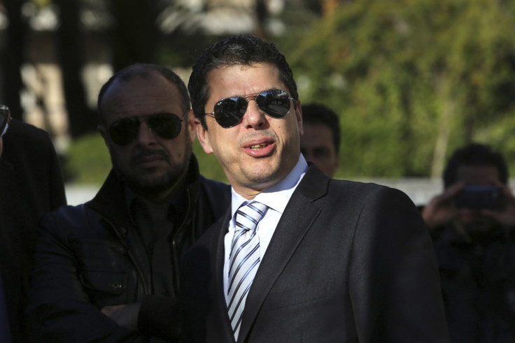 Extreme-right Golden Dawn party lawmaker Stathis Boukouras arrives at a courthouse in Athens