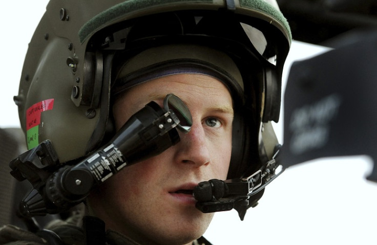 Harry sits in his Apache helicopter in Camp Bastion, southern Afghanistan.