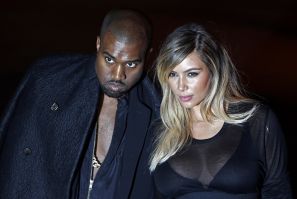 Kim Kardashian with fiancé Kanye West at the Givenchy Spring/Summer 2014 women's ready-to-wear fashion show during Paris Fashion Week.