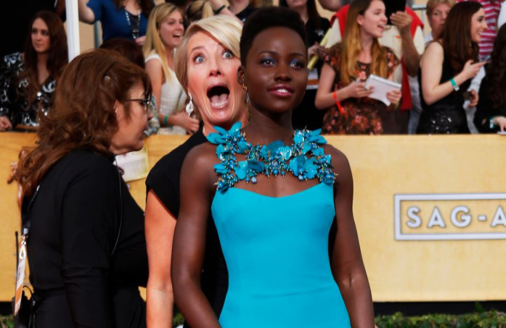 Actress Emma Thompson photobombed Kenyan actress Lupita Nyong'o as she hit the red carpet at the 20th annual Screen Actors Guild awards in Los Angeles, California.
