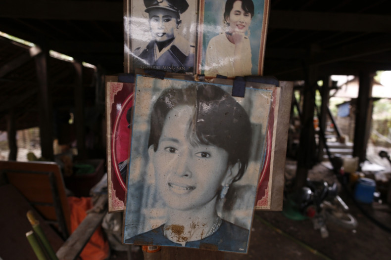 Portraits of Aung San Suu Kyi and her father Aung San are seen in a National League for Democracy branch office that was thrown into disarray during violence at Shwe Lay village, outside of Thandwe in Rakhine state