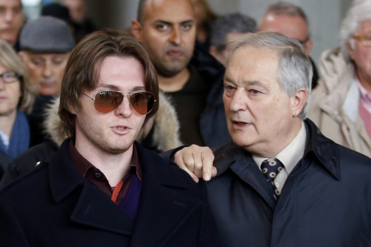 Raffaele Sollecito (L) with his father Francesco outside court in Florence, ahead of the Meredith Kercher murder trial verdict