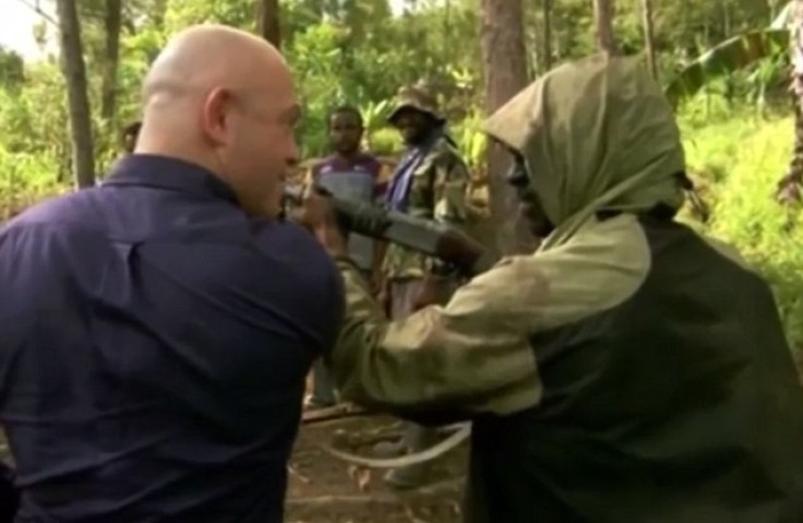 Gunman meets the former face of enforcement in Walford in a Papua New Guinea forest