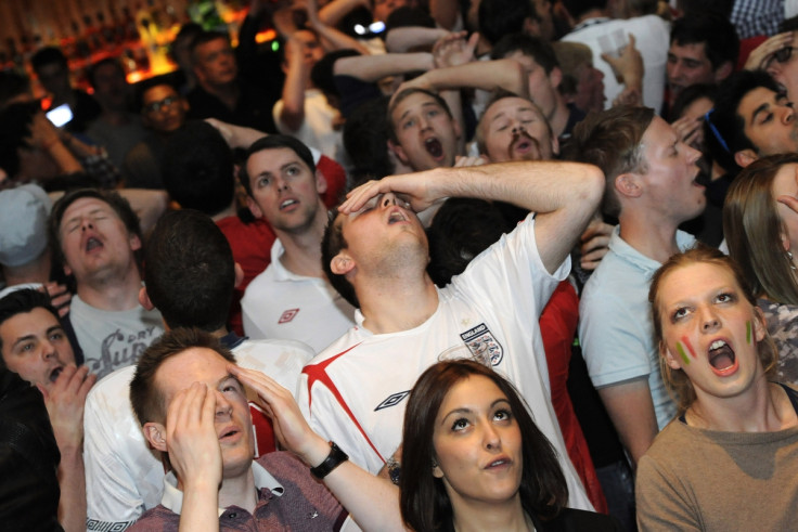 England fans in a London pub watching england's defeat to Italy in the quarter finals of ther 2012 European Championship.