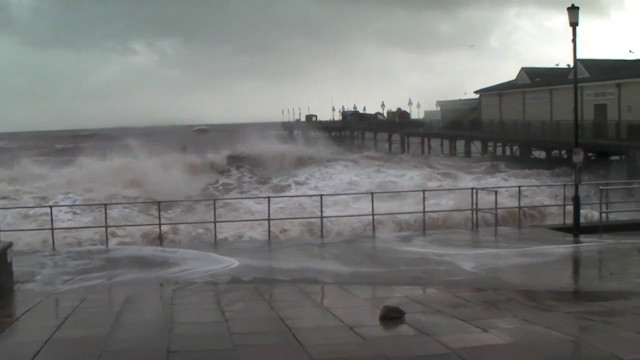 Cameron Pledges More Aid as Storms Batter Coastline