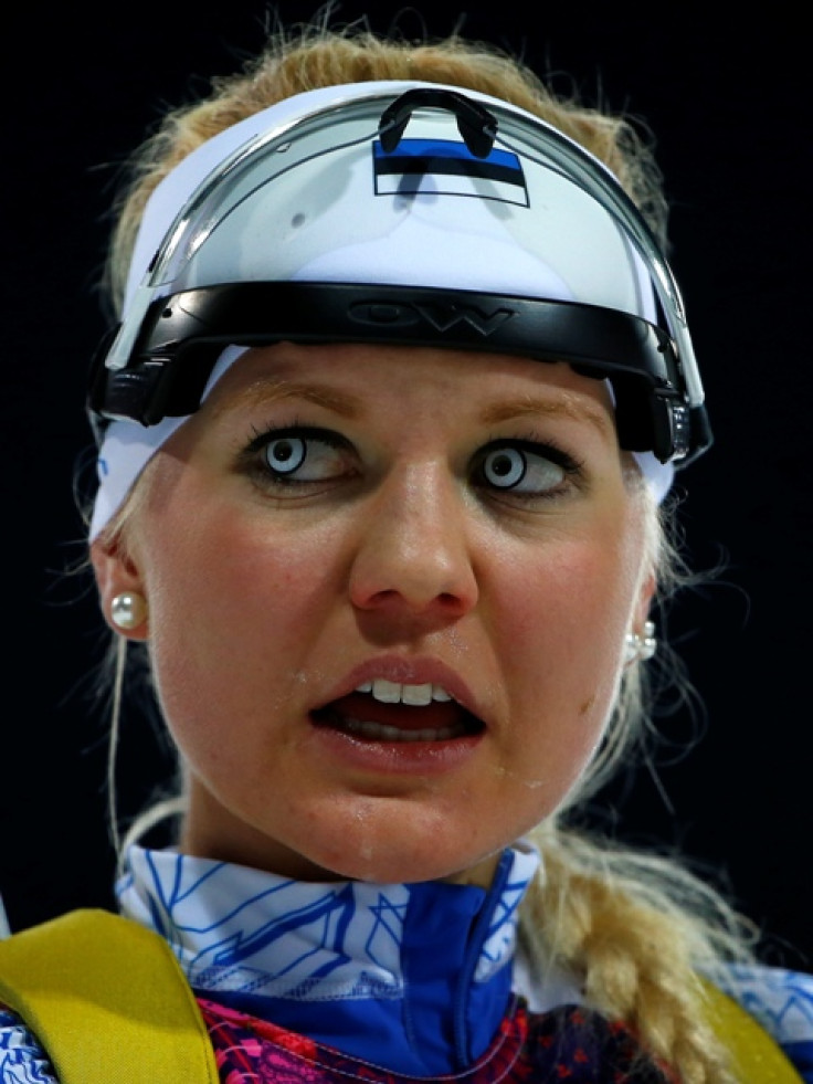 Estonia's Grete Gaim reacts after crossing the finish line during the women's biathlon 7.5km sprint event at the Sochi 2014 Winter Olympics in Rosa Khutor February 9, 2014.