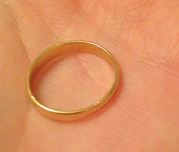 A gold wedding ring inscribed "Christophe Nelly 14-06-1986"  has been found near Edinburgh Castle