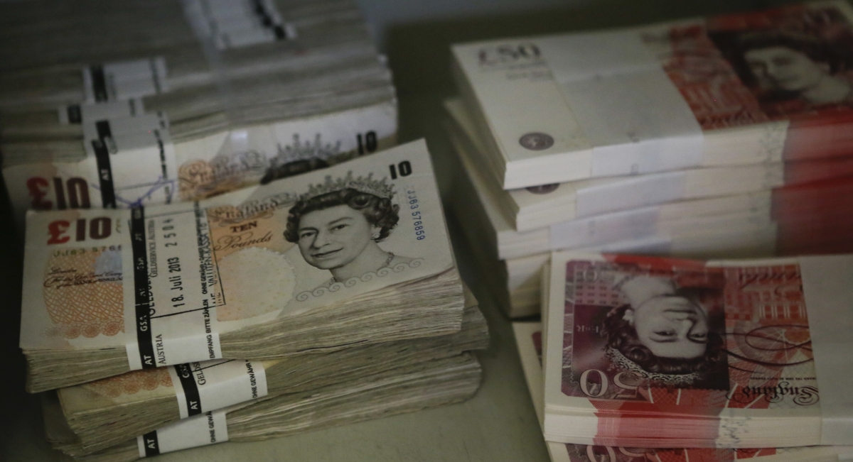 Sterling falls to 17-month low vs dollar ahead of BoE rate decision, US