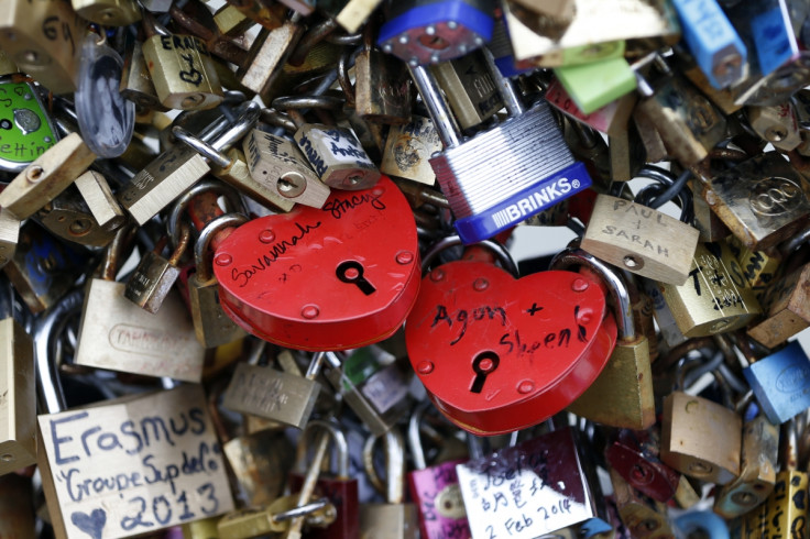 Thousands of padlocks clipped by lovers are seen on the fence of the Pont des Arts over the River Seine in Paris