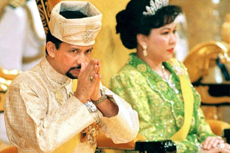 Mariam Azim pictured with Sultan Hassanal Bolkiah of Brunei at his 53rd birthday celebration.