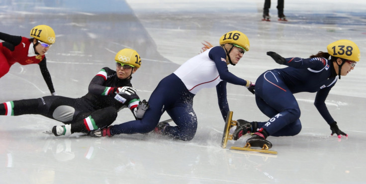 Italy's Arianna Fontana (2nd L), Britain's Elise Christie (2nd R), and South Korea's Park Seung-hi (R) crash, during the women's 500 metres short track speed skating final at the Sochi Winter Olympics