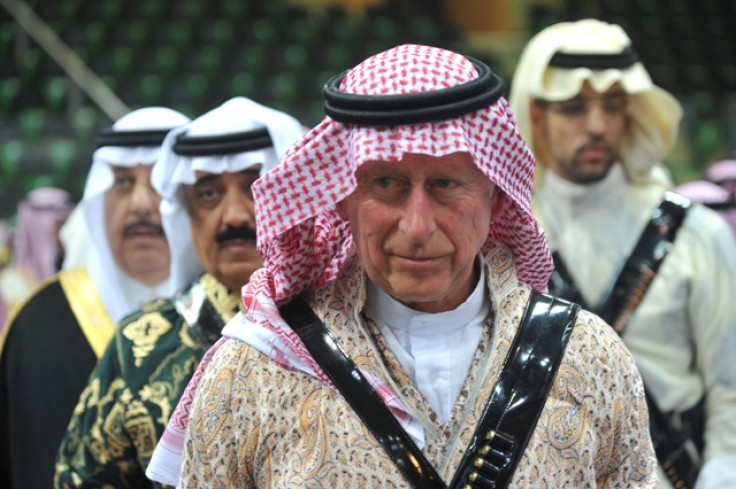 Prince Charles arrives to participate in the traditional Saudi dancing known as 'Arda' during the Janadriya culture festival at Der'iya in Riyadh