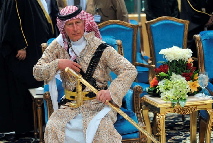 Britain's Prince Charles, wearing a traditional Saudi attire, attends the traditional Saudi dance