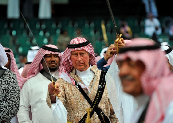 Prince Charles performing the traditional Saudi dance
