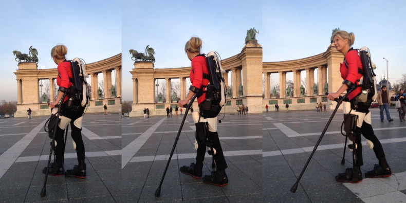 Amanda Boxtel walks in the world's first 3D printed hybrid robotic exoskeleton suit