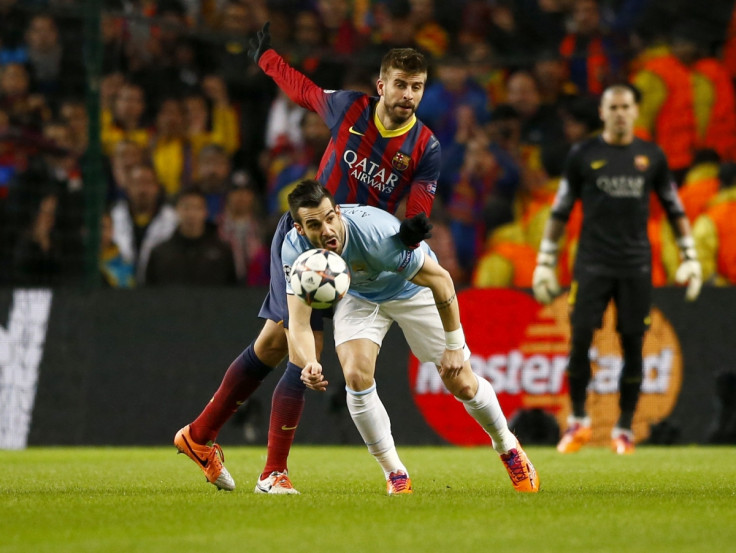 Alvaro Negredo was booked following a tackle to Pique.