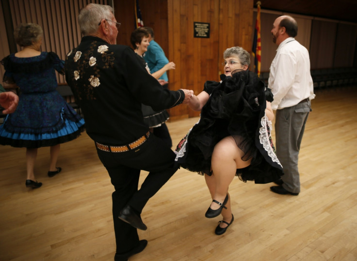 Dancing elderly couple