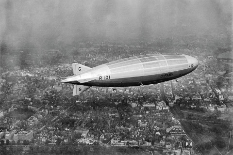 The R101 airship on its first test flight, Westminster, from the west, 1929
