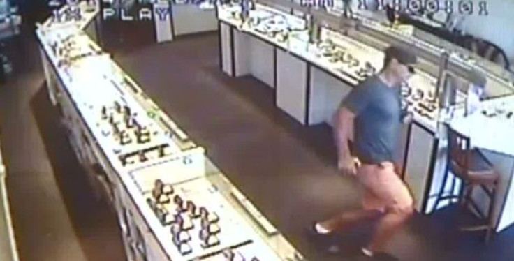 CCTV footage shows the thief fleeing the jewellers in Cairns, Queensland.