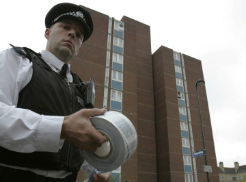 Policeman at a murder scene in south east London Policeman at a murder scene in south east London