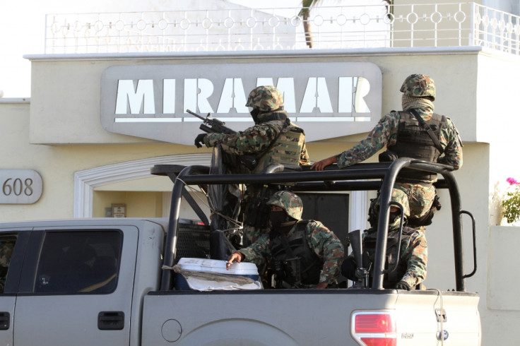 Military personell guard the Miramar complex in Mazatlan, where Guzman was arrested.