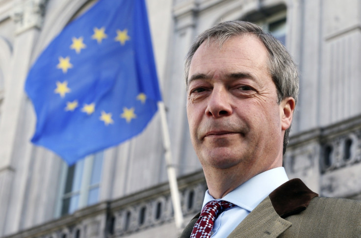 Nigel Farage beneath the EU flag in Brussels