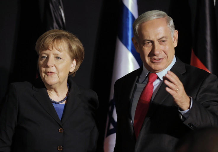 srael's Prime Minister Benjamin Netanyahu (R) stands next to German Chancellor Angela Merkel