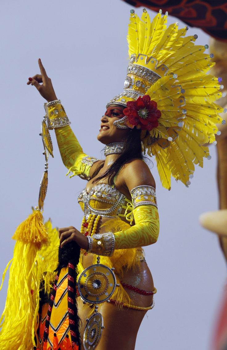 A reveller from the Tom Maios samba school takes part in the first night of the Special Group category of the annual Carnival parade in Sao Paulo's Sambadrome March 1, 2014.