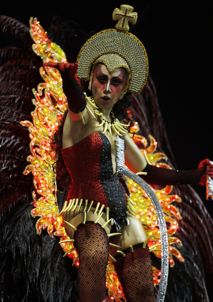 A reveller from the X9 samba school takes part in the first night of the Special Group of the annual Carnival parade in Sao Paulo's Sambadrome March 1, 2014.