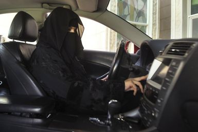 A Saudi woman takes part in a day of protest against the kingdom's ban on female drivers.