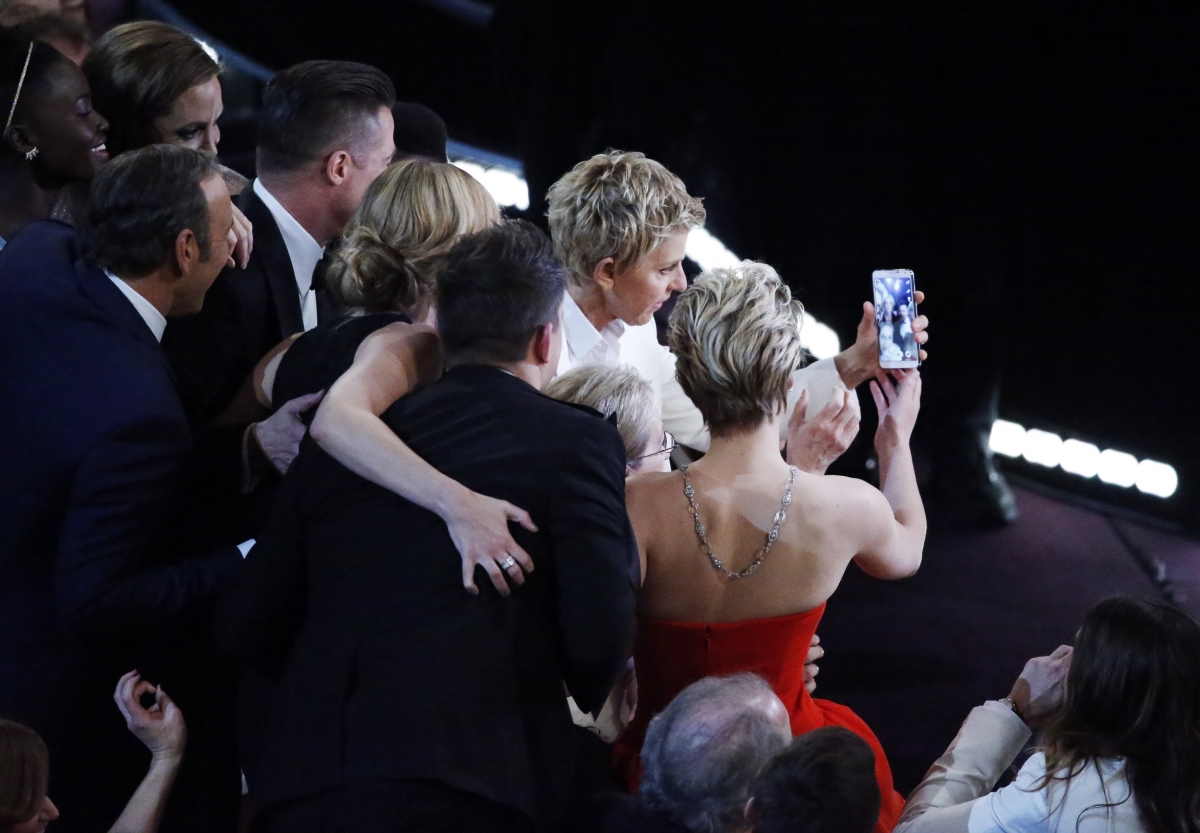 Host Ellen Degeneres takes a group picture at the 86th Academy Awards in Hollywood, California
