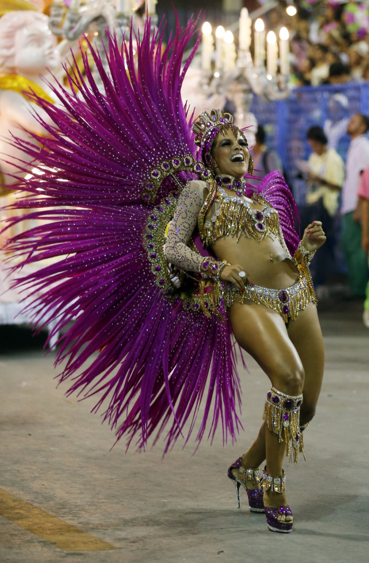 A reveller of the Mangueira samba school participates in the annual Carnival parade in Rio de Janeiro's Sambadrome, March 3, 2014