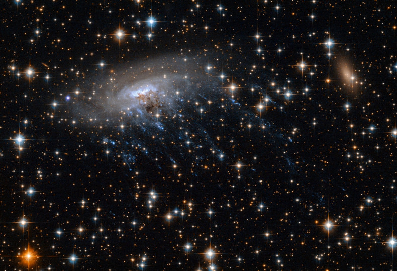 spiral galaxy ESO 137-001 destroys galaxy cluster