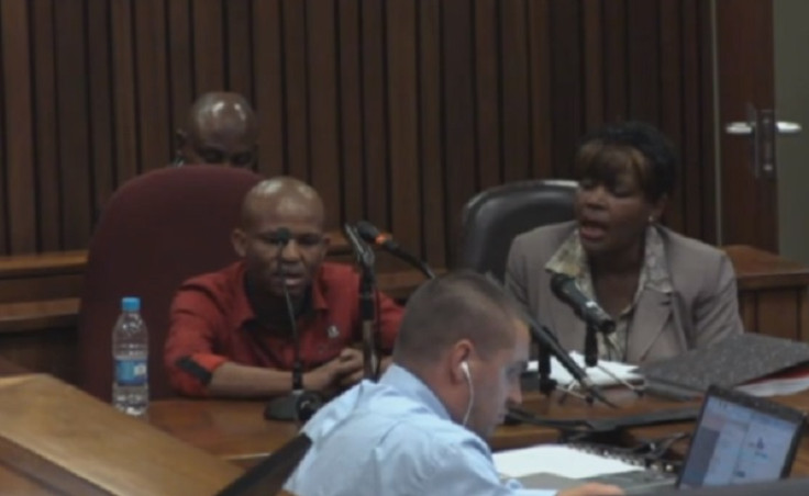 Pieter Baba gives evidence at the Oscar Pistorius murder trial via an interpreter