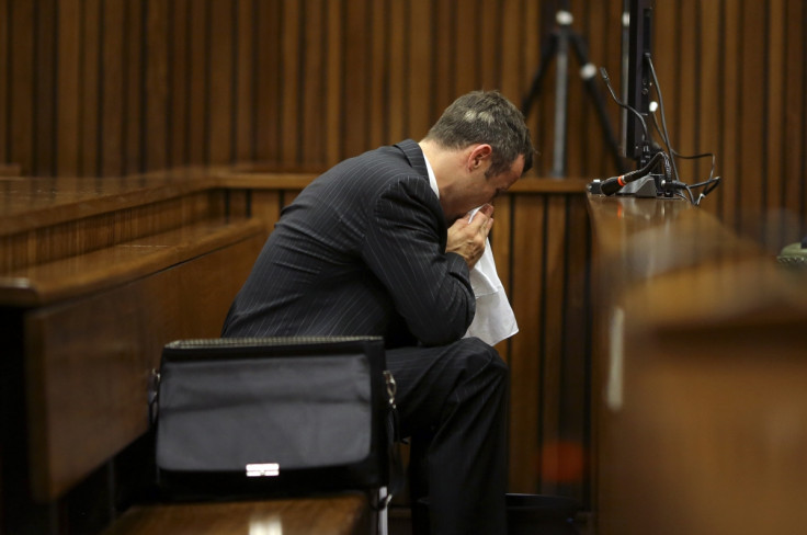 Oscar Pistorius vomited repeatedly in to a bucket as Prof Gert Saayman described what 9mm Parabellum 'ranger' bullets did to Reeva Steenkamp