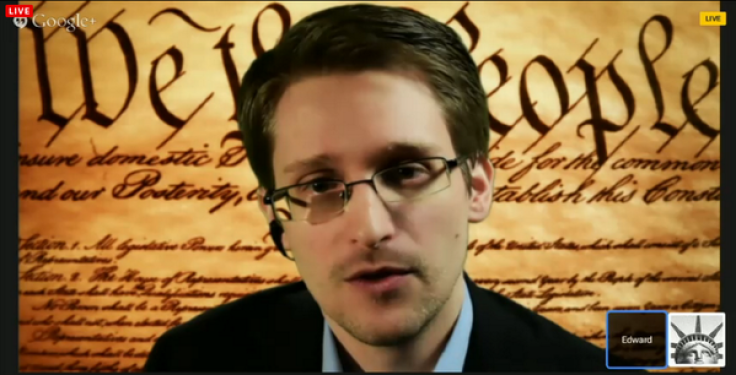 Edward Snowden stands in front of the First Amendment of the US Constitution