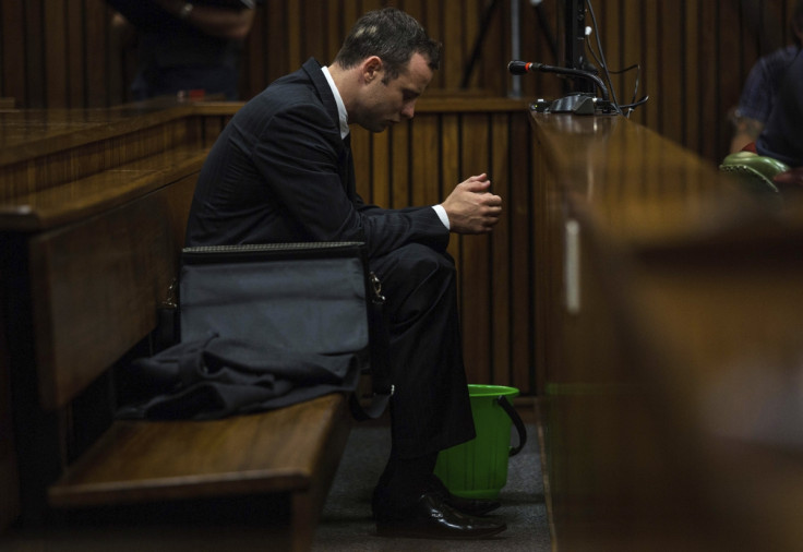 Oscar Pistorius in court of day seven of his murder trial heard lawyer Barry Roux question testimony of Prof Gert Saayman