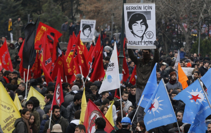 A demonstrator holds up a poster of Berkin Elvan, which reads: " For Berkin, for Justice", during a protest in Ankara