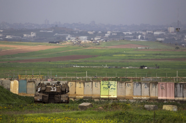 An Israeli tank is positioned outside the northern Gaza Strip