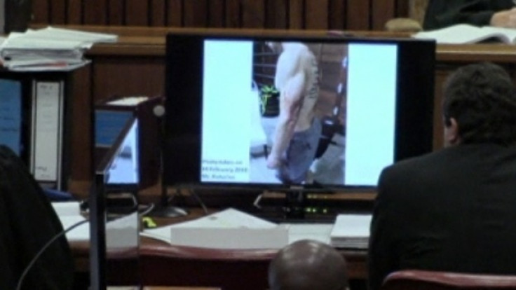 Photogrpahs of Oscar Pistorius taken soon after he had shot dead Reeva Steenkamp were shown in court