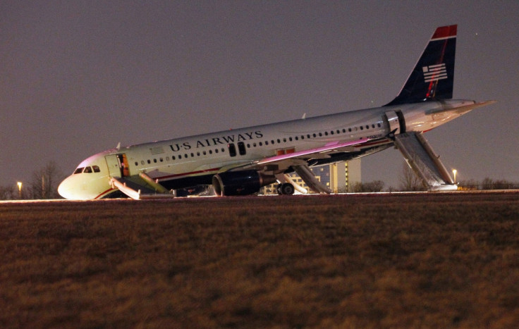 A US Airways plane with a collapsed nose is seen at Philadelphia International Airport March 13, 2014.