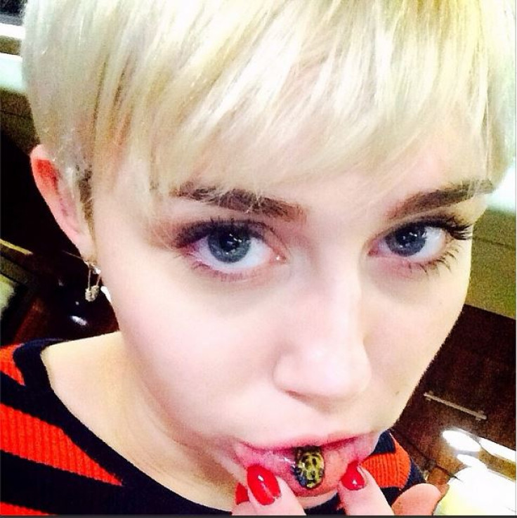 Miley Cyrus Gets Sad Kitty Tattoo