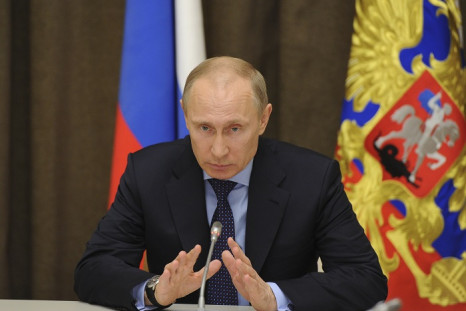 Russian President Vladimir Putin said Crimea's referendum fully complies with international law despite being roundly condemned by world leaders.